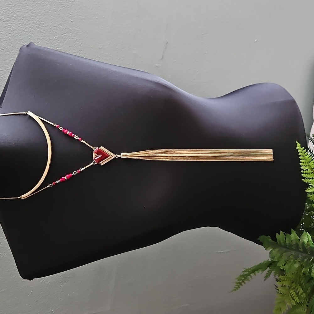 WHBM choker style gold necklace featuring long tassel